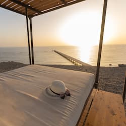 Private beach, white sand, sun loungers, beach umbrellas