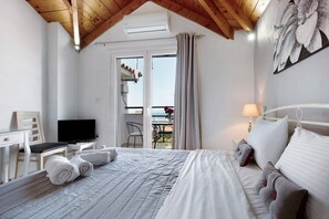 Tabla de planchar con plancha, wifi gratis y ropa de cama 