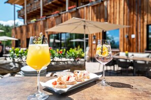Outdoor dining - Holiday Apartment "Schartneralm Zirbel Family" with View of the Dolomites, Terrace & Sauna (Collalbo Renon)