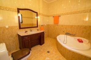 Bathtub, hair dryer, towels