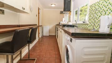Fridge, electric kettle, toaster, cookware/dishes/utensils