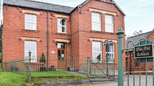 A red brick building with a sign reading 'The Old School.' - 2 bedroom accommodation in Commondale, near Whitby (Commondale, near Whitby)
