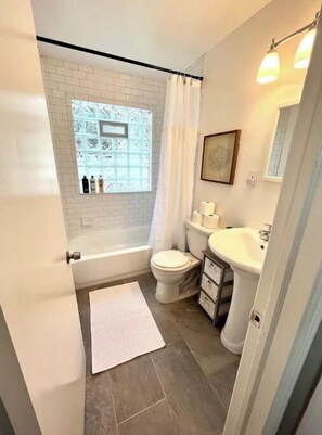 Combined shower/bathtub