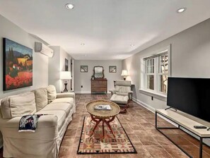 Smart TV, fireplace, DVD player, books