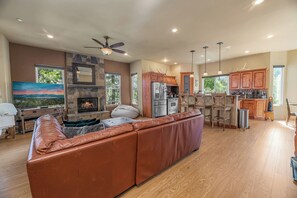 Flat-screen TV, fireplace, foosball