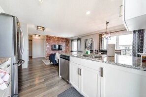 Fridge, microwave, oven, stovetop - Bright Luxe Condo AC Top Floor King Bed Balcony (Edmonton)