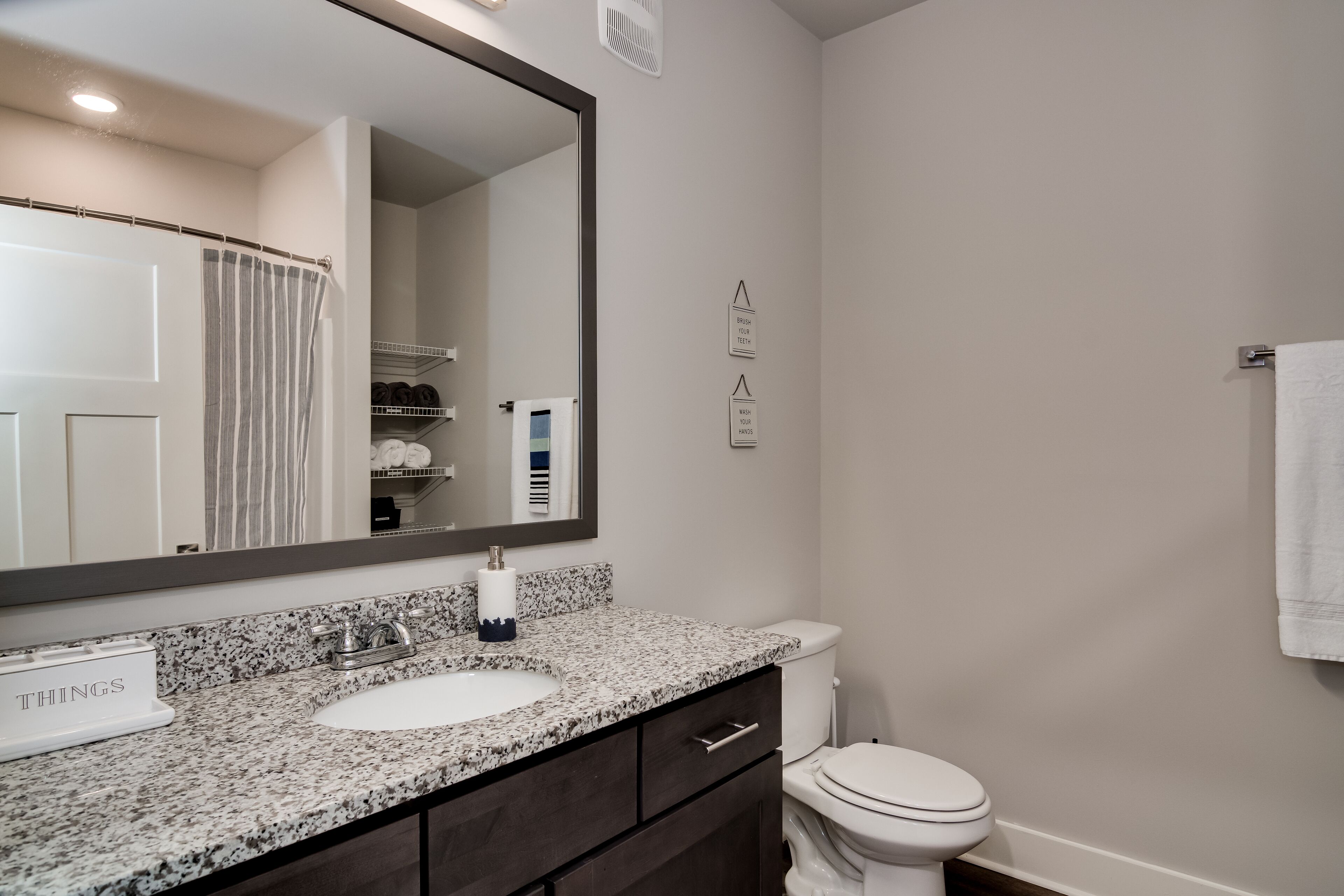 Combined shower/tub, hair dryer, towels, soap