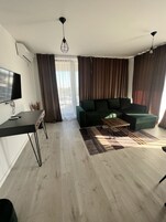 Suite Supérieure | Coin séjour