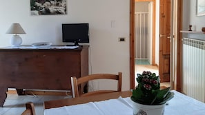 Work in comfort with a desk, chair, and flat-screen monitor.