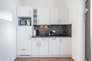 Leilighet – classic | Eget kjøkken | Kjøleskap, oppvaskmaskin, espressomaskin og kaffetrakter/tekoker