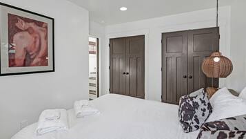 1 bedroom, desk, iron/ironing board, travel cot