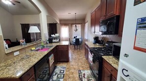 Fridge, microwave, coffee/tea maker, dining tables