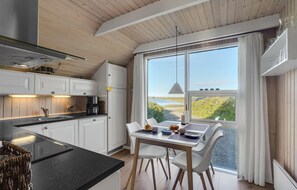 Fridge, stovetop, dishwasher, coffee/tea maker