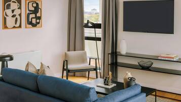 40-inch flat-screen TV with cable channels, TV