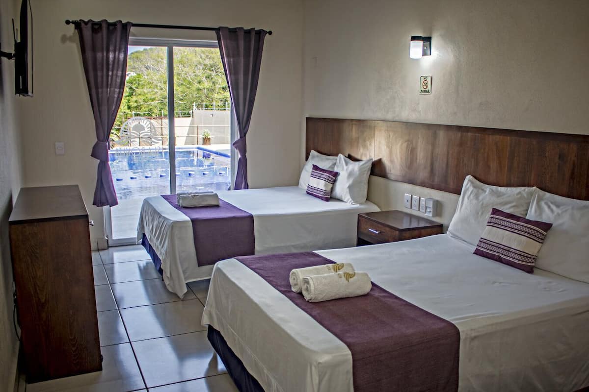 Habitación doble clásica | Cortinas blackout, tabla de planchar con plancha y wifi gratis