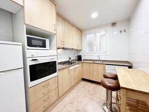 Réfrigérateur, micro-ondes, four, lave-vaisselle