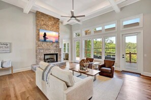 TV, fireplace - Coveside Spacious 5BR Waterfront Home (Six Mile)