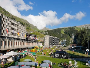 Enjoy stunning views of lush green hills and blue skies from our hotel's scenic balconies.