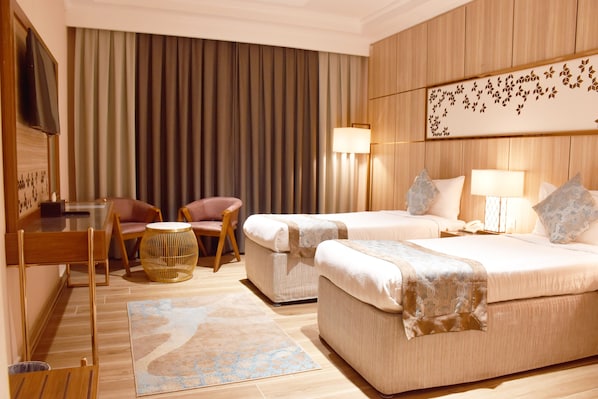 Twin Room, Multiple Beds | Minibar, in-room safe, blackout drapes, soundproofing - Midan Hotel (Makkah)