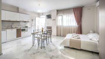 Family Apartment | 1 bilik tidur, langsir/tirai gelap terus, kalis bunyi, Wi-fi percuma