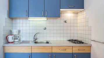 Fridge, stovetop, coffee/tea maker, electric kettle