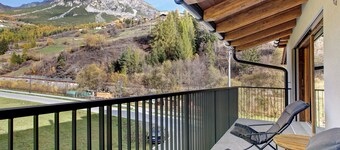 Appartamento "Violet a due passi da Bormio" con vista sulle montagne, balcone privato e Wi-Fi