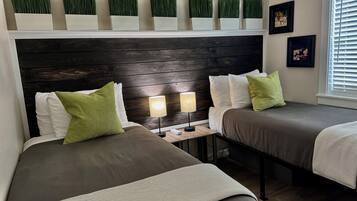 2 dormitorios, tabla de planchar con plancha, wifi gratis y ropa de cama