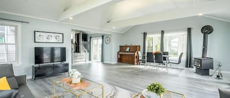 Design Cabin, Hot Tub, Lakeside | Living area | 43-inch flat-screen TV with cable channels, TV, fireplace