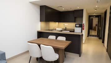 Family Apartment, 2 Twin Beds, 2 Bathrooms | Living area | 43-inch Smart TV with satellite channels, TV, streaming services