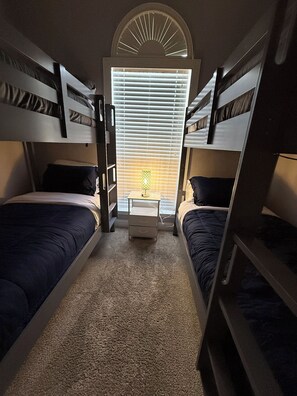 A bunk bed room with a window and a lamp. - Luxurious home /Pool/GameR/BBQ/kingbed/legacyW/Frisco (plano)