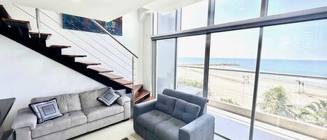 Exclusive Apartment | Living area | 50-inch LED TV with digital channels, TV