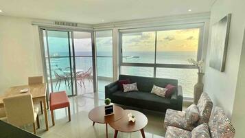 Luxury Apartment | Living area | 50-inch LED TV with digital channels, TV