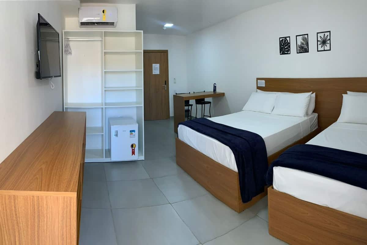 Basic Triple Room, Multiple Beds, City View | Minibar, desk, laptop workspace, free WiFi