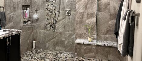Combined shower/tub, hair dryer, towels, soap