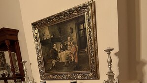 A fireplace with a painting above it, a candlestick, and a tray. - Magnificent historic homestead (Birdwood)