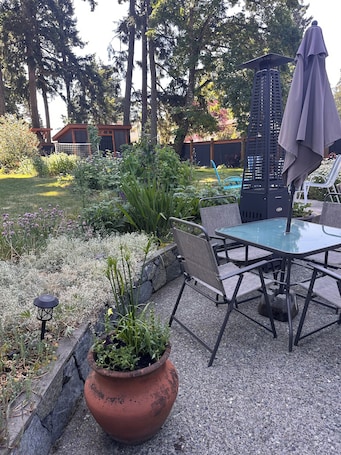 Outdoor dining. Garden-Level Suite in Quiet Colwood Neighbourhood