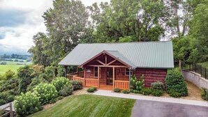 A rustic cabin with a metal roof, wooden porch, and surrounded by lush greenery. - 2 Acres of pure paradise with amazing Mountain View’s!! Minutes from Emory&Henry (Meadowview)
