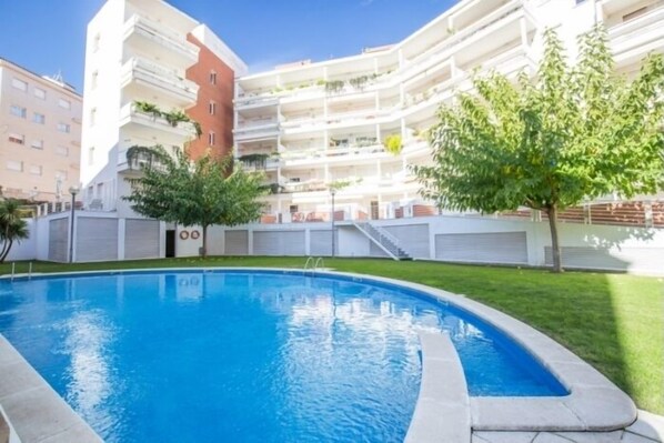 Pool - Precioso apartamento con piscina y jardín propio (Lloret de Mar)