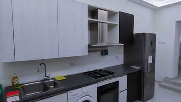 Appartement, 1 grand lit | Cuisine privée | Réfrigérateur, four, plaque de cuisson, bouilloire électrique