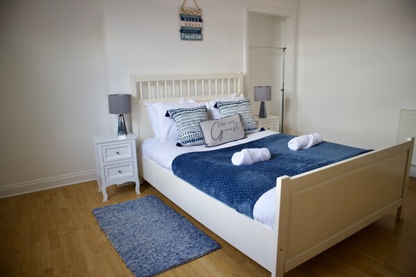 Departamento, varias camas | 2 habitaciones, tabla de planchar con plancha y wifi gratis