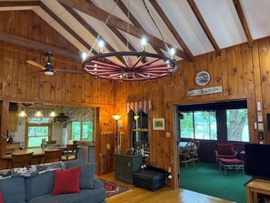 Smart TV, fireplace, books, offices