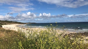 Beach nearby, sun loungers