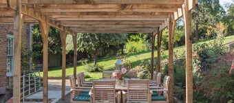 Stone Hall Farmhouse is a stunning Grade II listed house with Georgian and Victorian origins, nestle