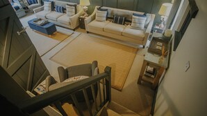A modern living room with a sofa set, a coffee table, and a side table with a lamp. - Rural Holiday Cottage With Log Burner (Buxton)