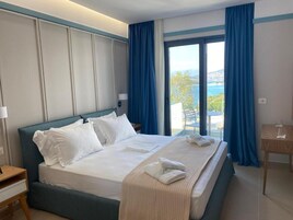 Deluxe Double or Twin Room, Partial Sea View | Desk, laptop workspace, soundproofing, free WiFi