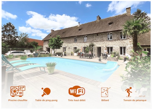 Magnificent stone villa with thatched roof and heated swimming pool