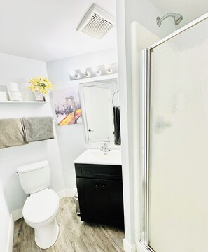 Shower, hair dryer, towels, soap
