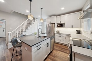 Fridge, microwave, oven, stovetop - Updated Townhome with Private Garage in South Side (Pittsburgh)