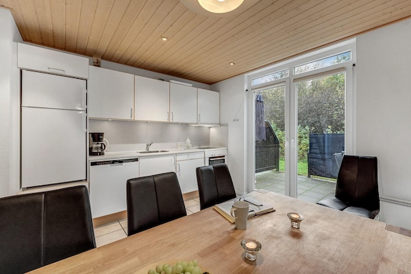 Fridge, stovetop, dishwasher, coffee/tea maker