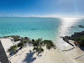 On the beach, sun-loungers, beach towels